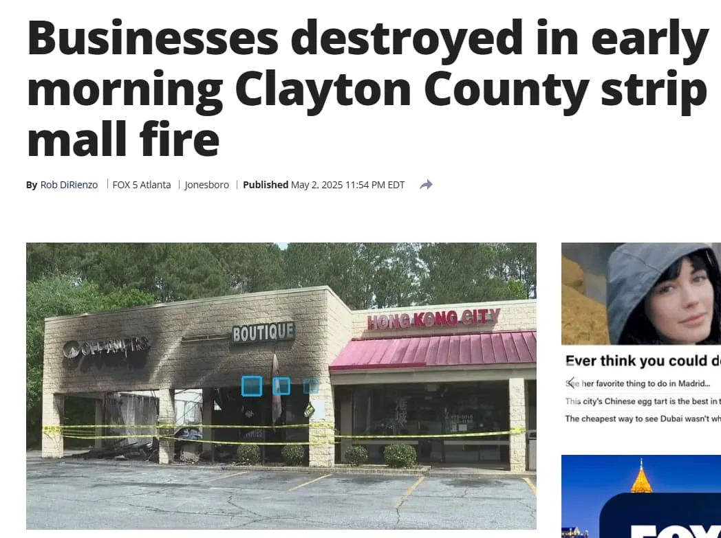 Burned storefronts after a strip mall fire in Clayton County, Georgia